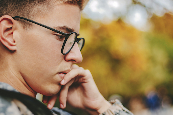 A young person thinking