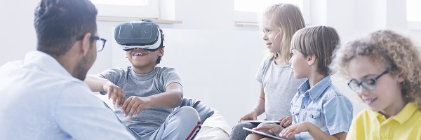 children using virtual reality headset