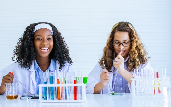 two girls in science class