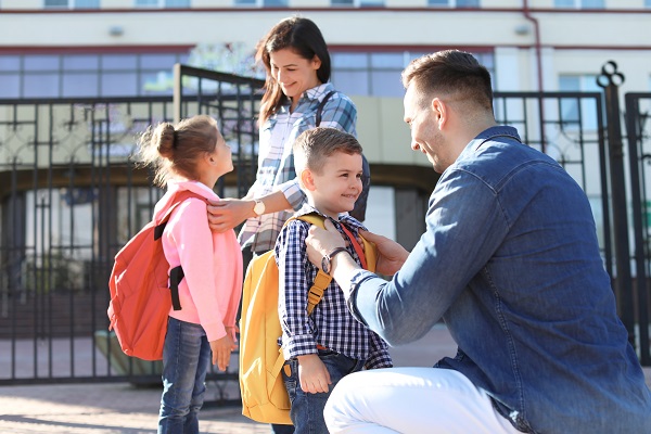 Parents with children at school