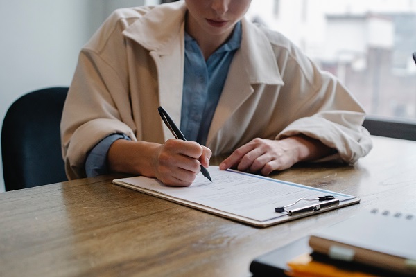 A woman filling in a questionnaire