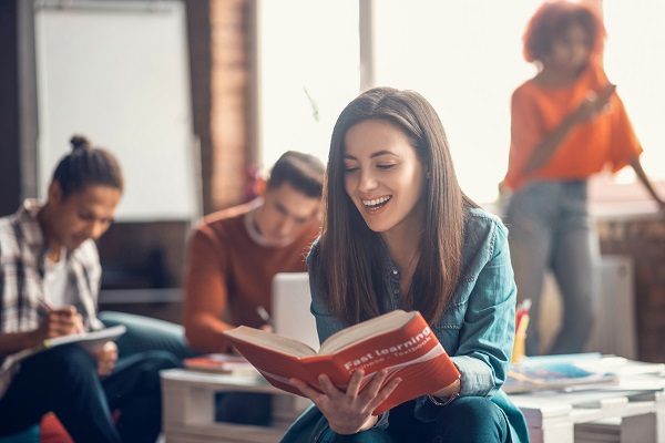 Student happy while studying foreign language 