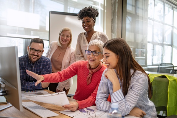 People discussing over a project in the office