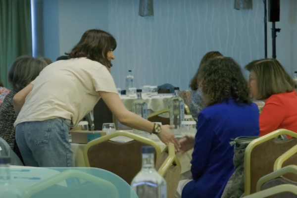people talking around a table