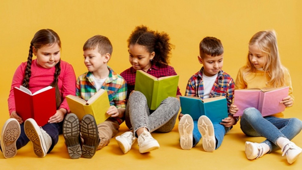 Children sitting and reading together