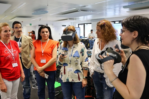 Participants in a Scientix workshop 2024 using a VR headset