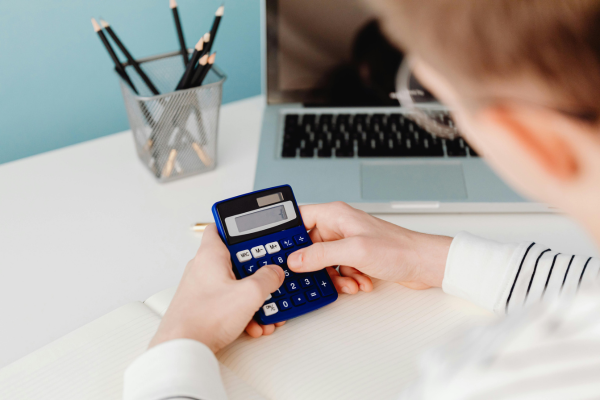 boy using a calculator