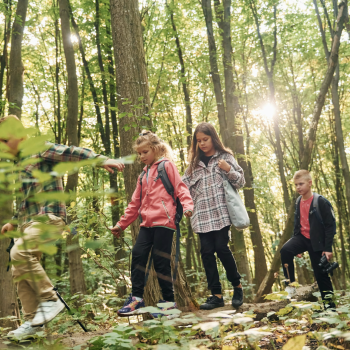 kids walking in forest