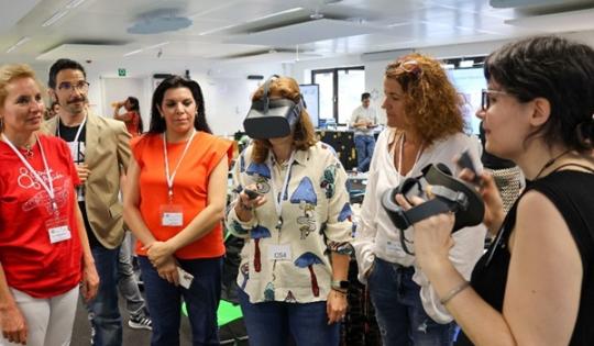 Participants in a Scientix workshop 2024 using a VR headset