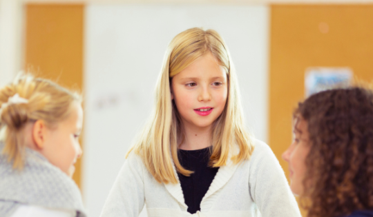 girls debating in class