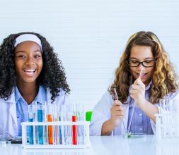 two girls in science class