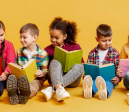Children sitting and reading together