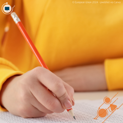 Child writing with a pencil