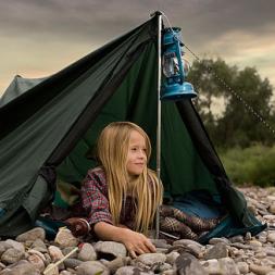 a girl in a camping tent