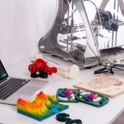 Laptop and robots on the desk