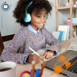 child in front of a computer
