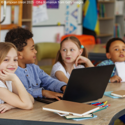 kids in class using a computer