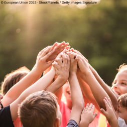 kids stacking hands
