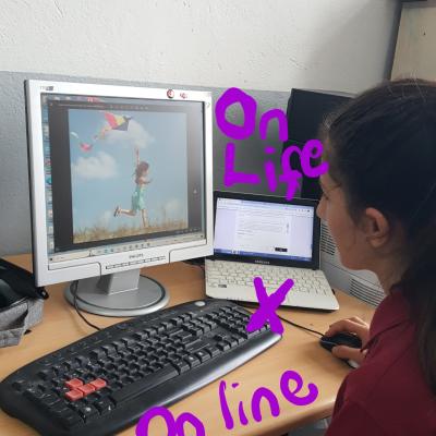 Onlife vs Online wriiten on the picture ; the girl  in front of the pc surfing the net the wall paper figures out the girl's wish 'the freedom ' The picture displayed a little girl flying a kite .The picture symbolizes  'Children kept by  Digital Life '