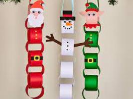 paper chain symol of christmas presenting Santaclaus, snowman and elf