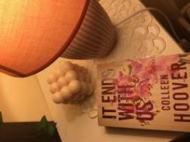 A book on a bedside table