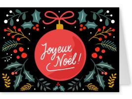 l'image représente une carte postale avec une boule de Noël rouge avec l'écrit "Joyeux Noël"