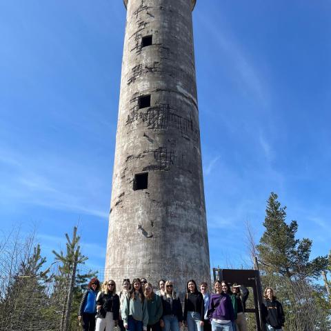 The group in front of the lighhouse The group gathered in front of the lighhouse