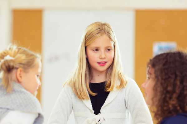 girls debating in class